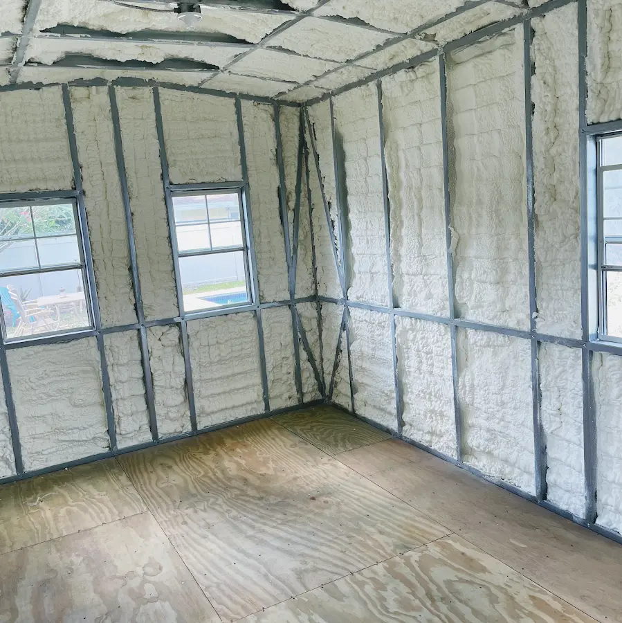 Closed-cell spray foam insulation applied to wall cavities in a residential project in Andover